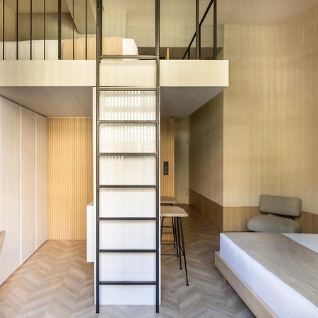 The Newel Psychiko Hotel Athena Bagian luar foto A ladder leading to a mezzanine