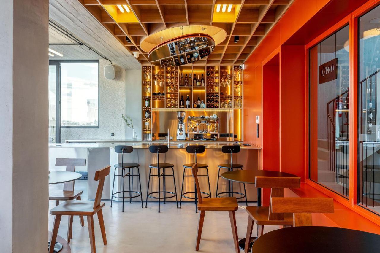 The Newel Psychiko Hotel Athena Bagian luar foto The interior of a Starbucks Reserve store in Milan, Italy