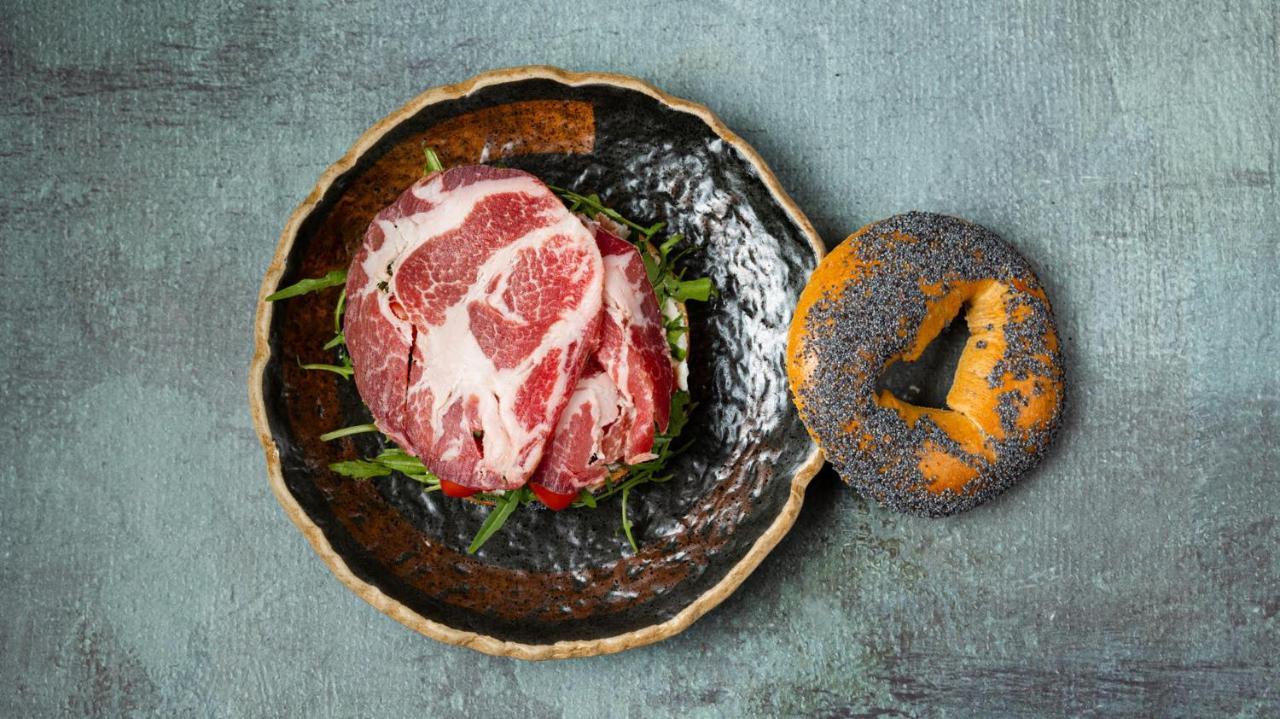 The Newel Psychiko Hotel Athena Bagian luar foto A piece of dry-aged beef