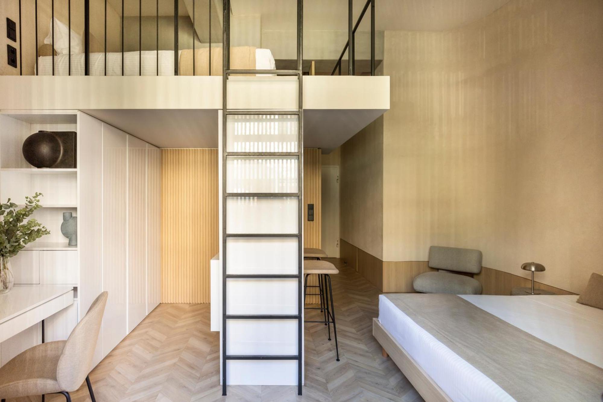 The Newel Psychiko Hotel Athena Bagian luar foto A ladder leading to a mezzanine