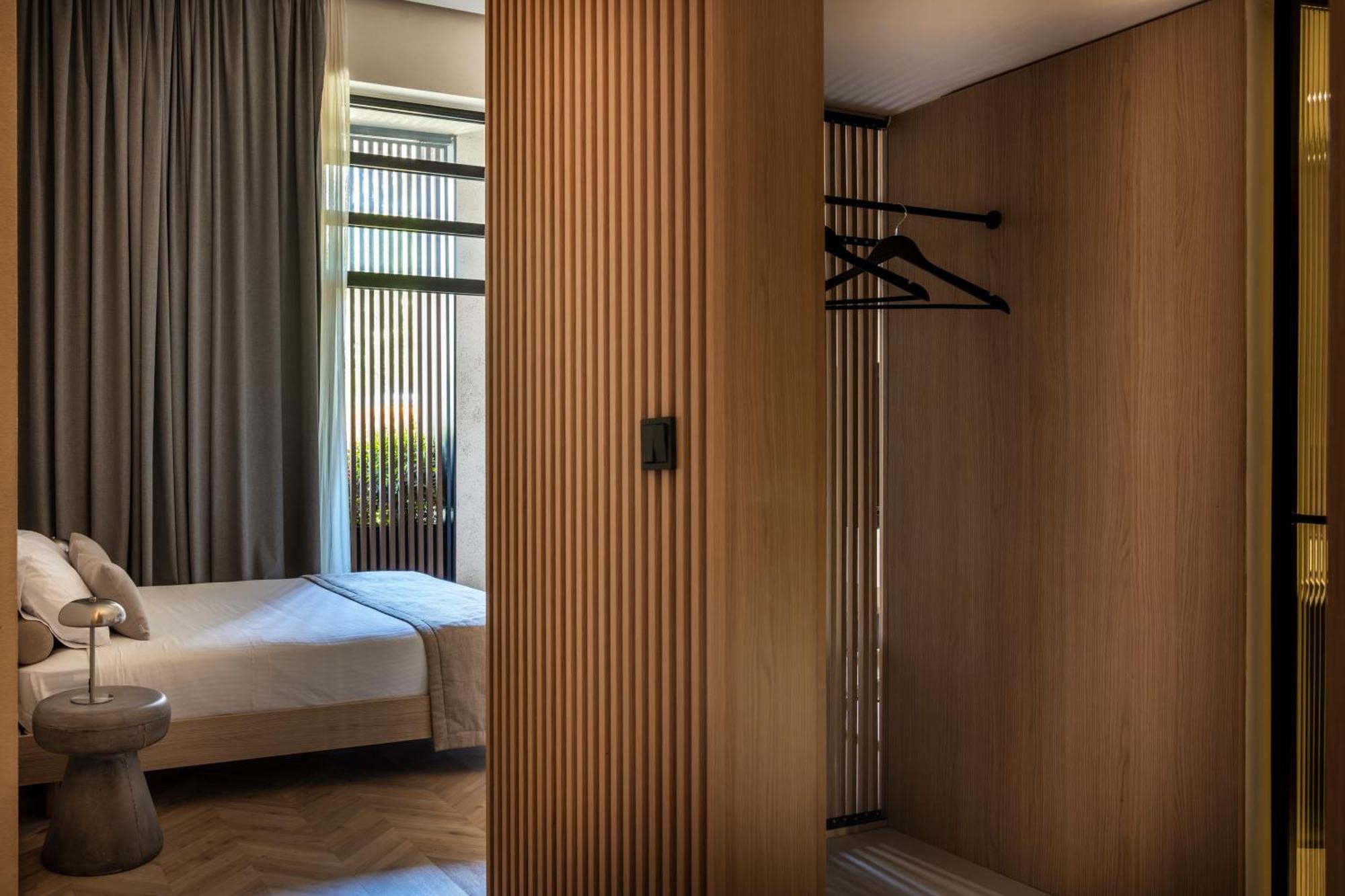 The Newel Psychiko Hotel Athena Bagian luar foto A room at the hotel